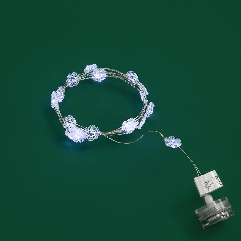 Гирлянда светодиодная "Снежинки" 2м 20LED бел. 2Вт 4.5В IP67 провод прозр. элементы питания 2хCR2032 (в компл.) Neon-Night 303-010